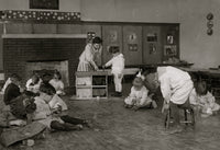Kindergarten children at Horace Mann School working on doll houses poster print.
