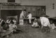 Kindergarten children at Horace Mann School working on doll houses poster print.