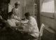 Bandaged finger hospital scene poster print, perfect for medical decor.