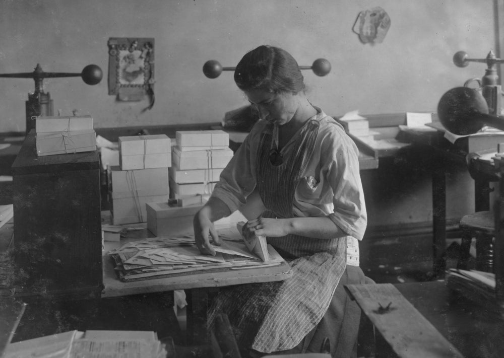 Vintage poster print of a 15-year-old girl packing envelopes at Harry C. Taylor's shop in Boston.
