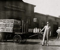 Expressman Hauls Cart of Crates at Wells Fargo Depot Poster Print