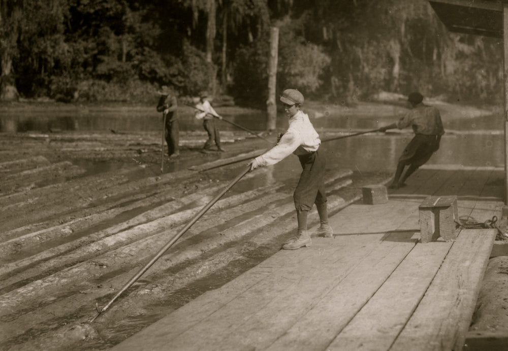 Lyman Frugia river-boy poster print showcasing hard work at a lumber mill.
