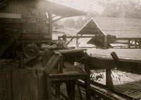 Dangerous Work Poster Print featuring a twelve year old boy working in a lumber mill.