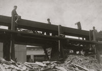 Two young boys working at Link Lumber Company poster print.