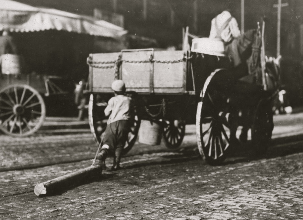 Boys hooking a log to a cart poster print.