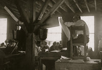 "Reader" in Cigar Factory poster print featuring a worker reading aloud.