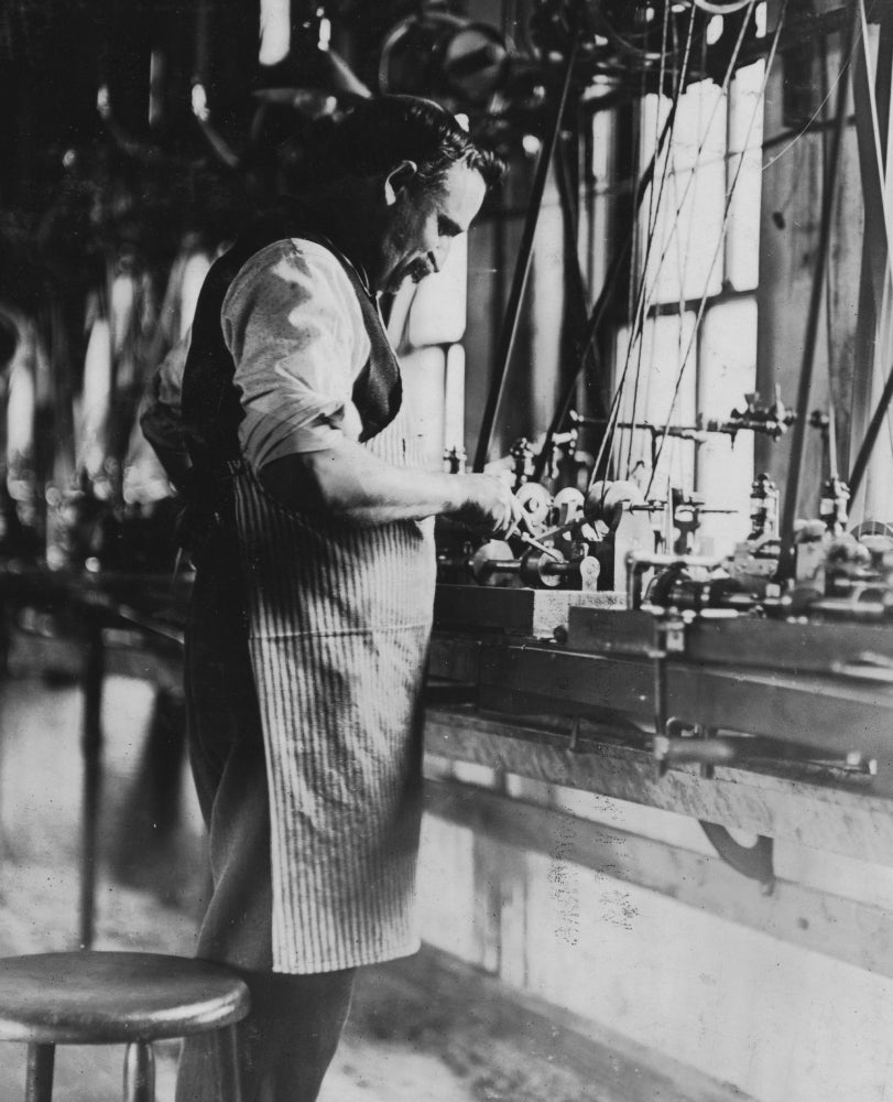 Watch Co. Vintage Poster Print featuring automatic screw machines in a factory setting.