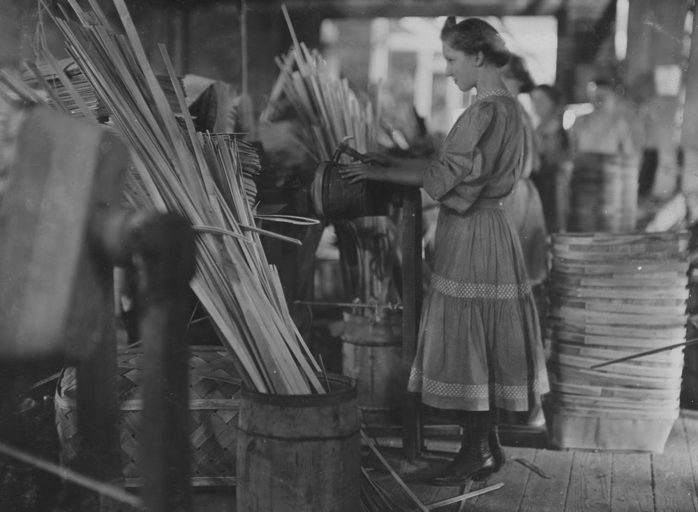 A Basket Factory poster print featuring girls making melon baskets