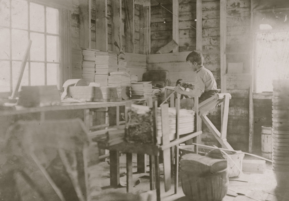 Poster print of a boy making melon baskets at a basket factory in Evansville, Indiana.