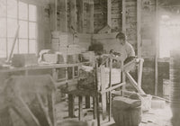 Poster print of a boy making melon baskets at a basket factory in Evansville, Indiana.