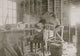 Poster print of a boy making melon baskets at a basket factory in Evansville, Indiana.