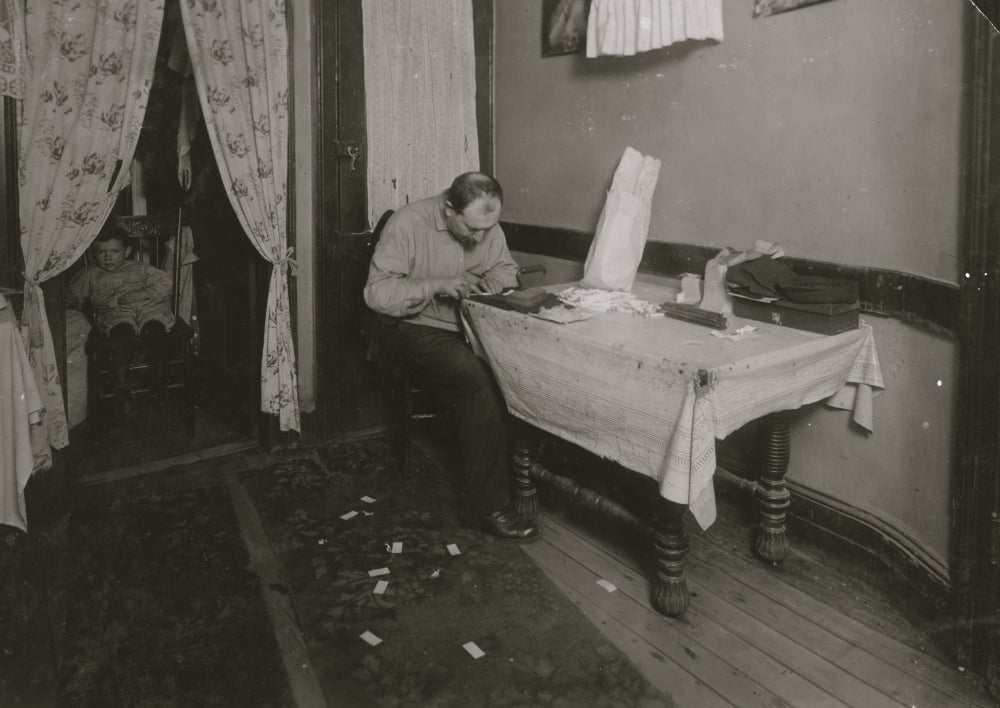 Rolling Cigarette Cases in Tenement Home Poster Print, urban life artwork.