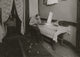 Rolling Cigarette Cases in Tenement Home Poster Print, urban life artwork.