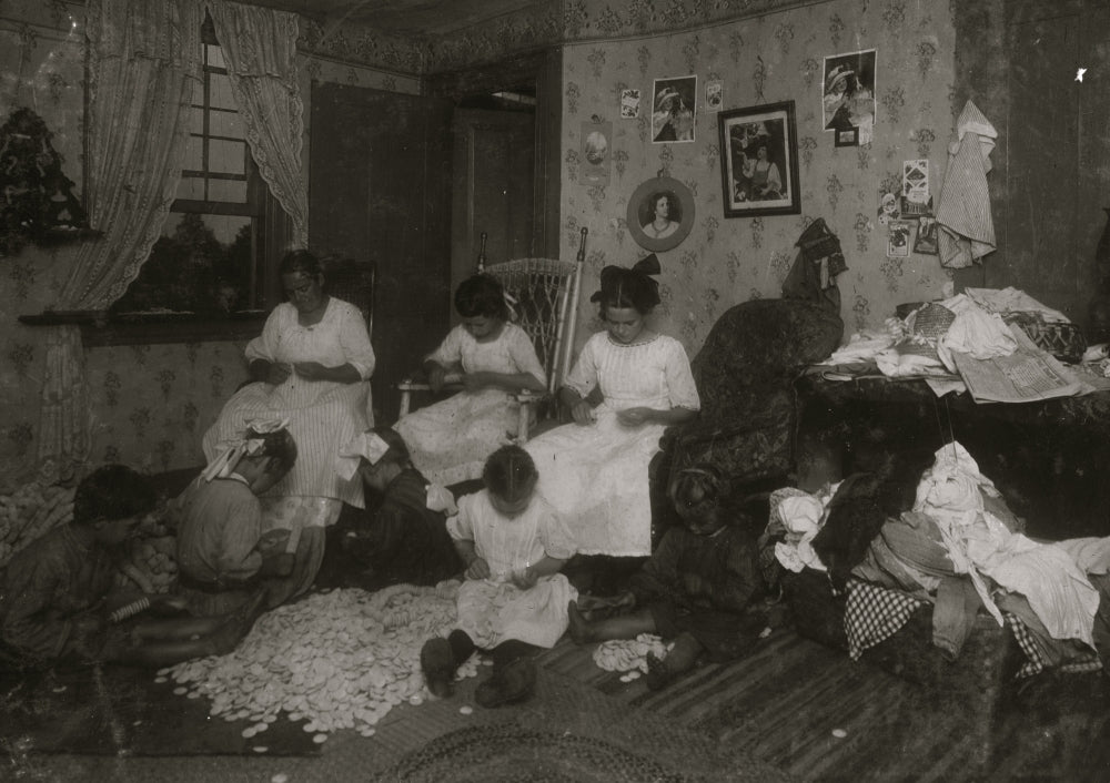 Stringing Wooden Buttons poster print depicting a family crafting scene.
