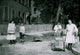 They Carry Home the Tags Poster Print depicting individuals carrying loads.