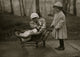 Children playing with Campbell Kid dolls poster print