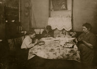 Flower Making poster print featuring George and Levia Bezzola working late on floral arrangements.