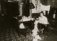 Annie Maier Working in the Kitchen Poster Print showcasing a woman crafting pinafores.