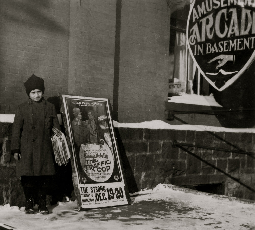 Morris Levine Poster Print - 212 Park Street featuring a young paper seller.