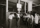 Messengers at the Main Office Poster Print showcasing Postal Telegraph Co. employees.