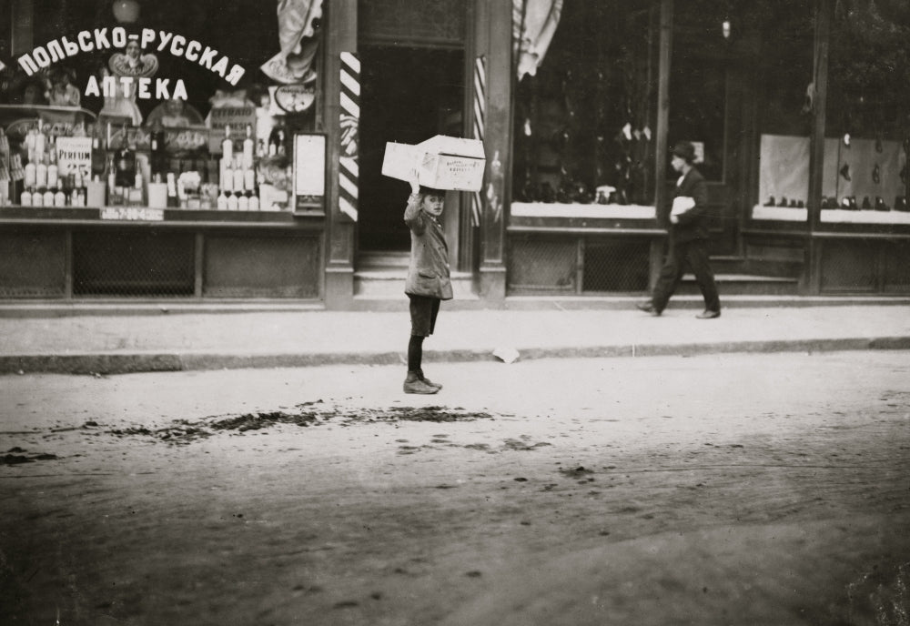 Carrying Wood Home in Front of a Polish & Russian Pharmacy Poster Print