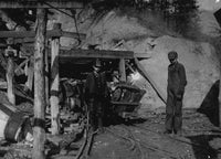 Hard Work and Danger Child Labor Poster Print showing a young boy in a coal mine.