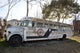 Old bus in Montgomery, Alabama with religious art and words.
