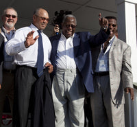 Ozzie Smith, Bruce Sutter, Reggie Jackson, Hank Aaron, and Rickey Henderson waving at Hank Aaron Boyhood Home Museum