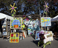 Fairhope Art Festival Poster Print depicting the vibrant festival atmosphere in Fairhope, Alabama.