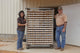 Dennis and Becky Salter next to their chickens in Monroe County, Alabama poster print