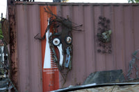 Charlie Lucas found object art poster print showcasing recycled materials.