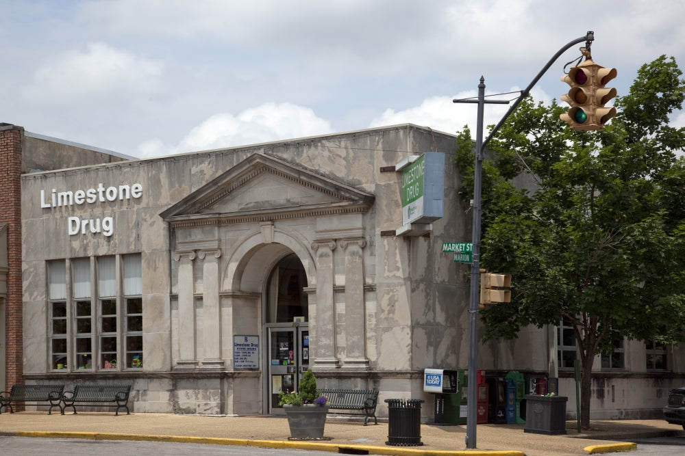 Limestone Drug Building Poster Print showcasing historic architecture.