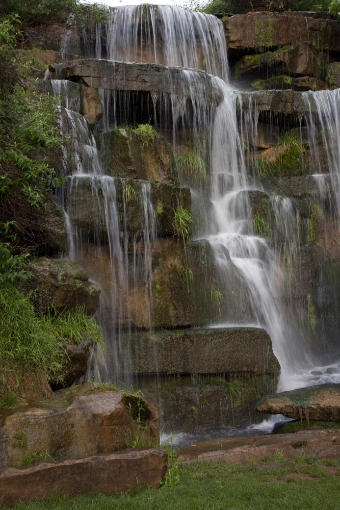 Waterfall in Spring Park Poster Print showcasing vibrant spring colors and serene nature scene.