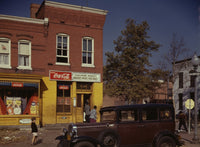 Car parked in front of Shulman's Market, Washington D.C. poster print.