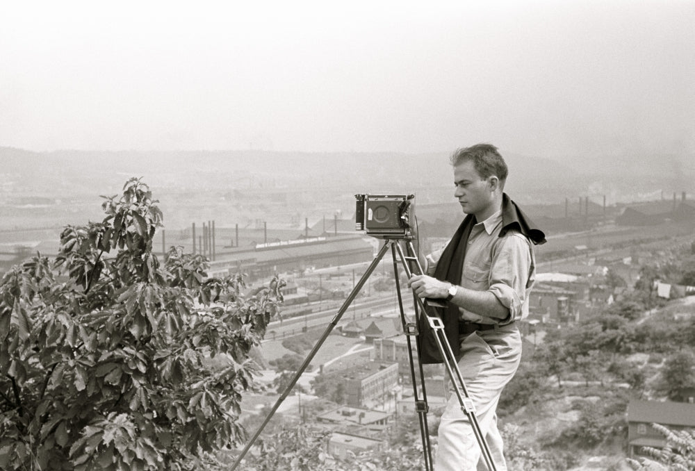 Cameraman Arthur Rothstein at Work Poster Print showcasing historic photography.