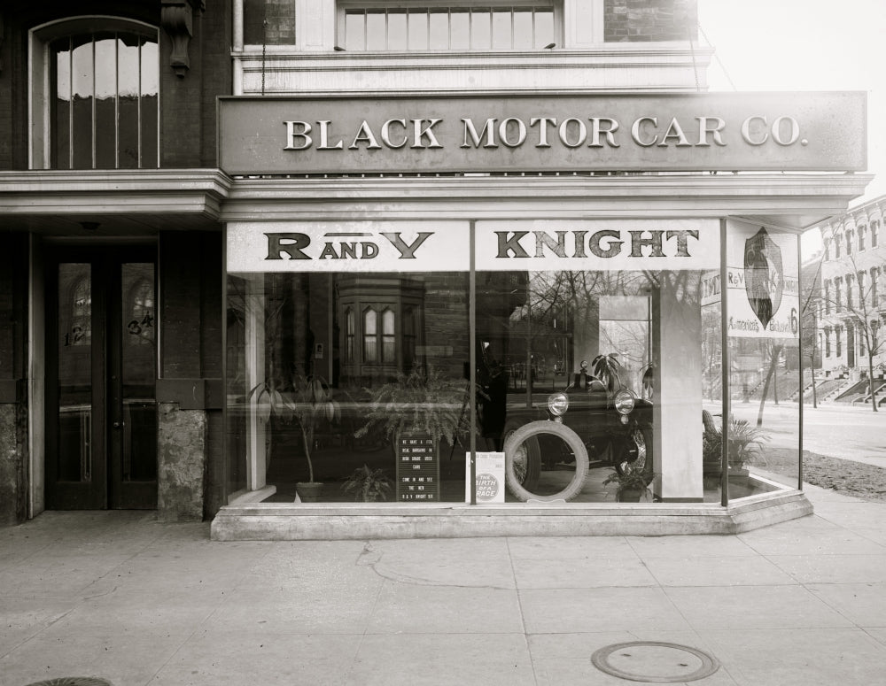 Black Motor Car Dealership Poster Print showcasing vintage automotive art.