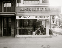 Black Motor Car Dealership Poster Print showcasing vintage automotive art.