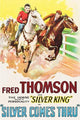 Cowboy on white horse winning a race on a track poster print.