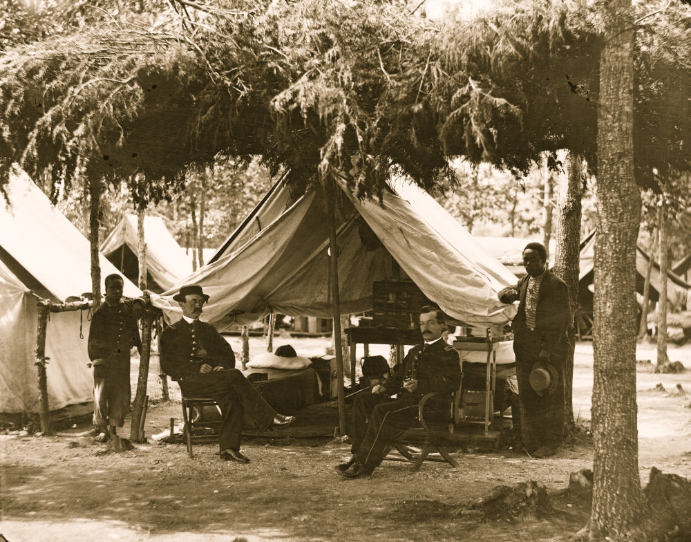Poster print of two military officers with young men in front of camp tent.