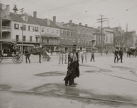 On a City Street Fish Seller Poster Print featuring a young African American man selling fish