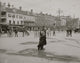 On a City Street Fish Seller Poster Print featuring a young African American man selling fish