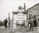 African American Worker on Machine for Extracting Acid from Phosphate Poster Print