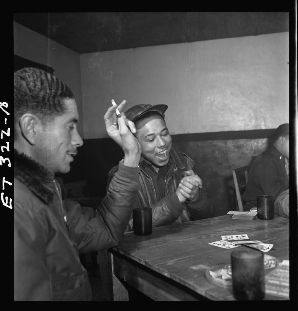 Historical military poster featuring Walter M. Downs and William S. Price III in Ramitelli, Italy, March 1945.