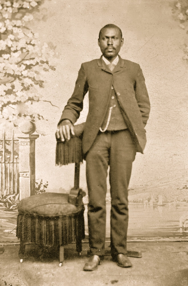 Portrait of an African American man standing poster print.