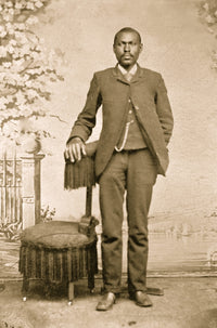 Portrait of an African American man standing poster print.