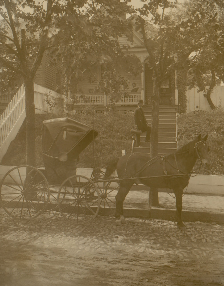 African American doctor with leather bag standing on steps, vintage scene.