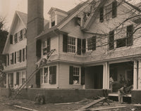 Students at work on a house built largely by them poster print.