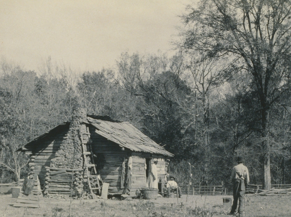 Three African Americans outside a cabin, poster print
