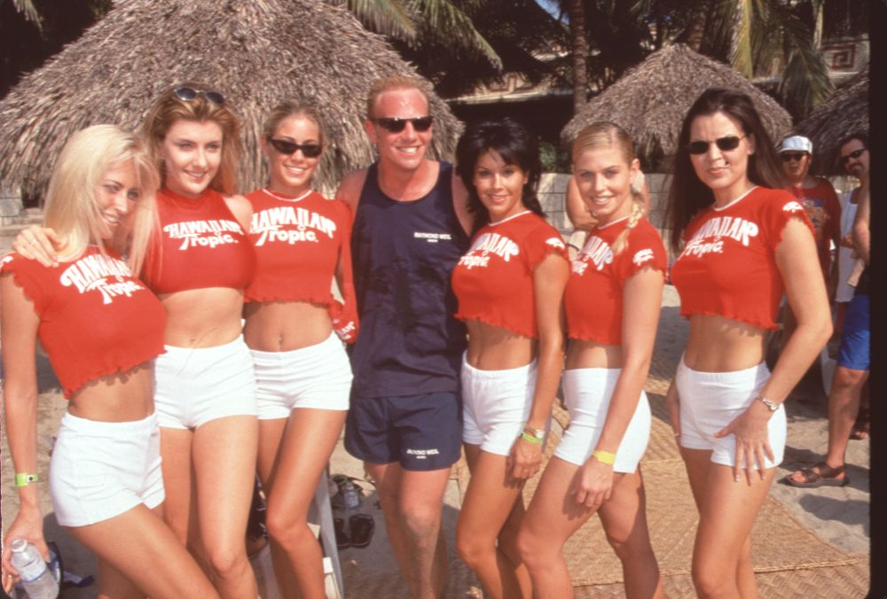 Ian Ziering photo print with Hawaiian Tropic girls, vibrant summer theme.