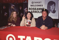 Roseanne Barr and Tom Arnold photo print at book signing event.